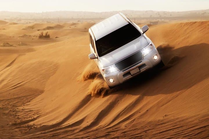Evening Desert Safari Dubai: Dune Bashing, Camel Rides & Sunset BBQ