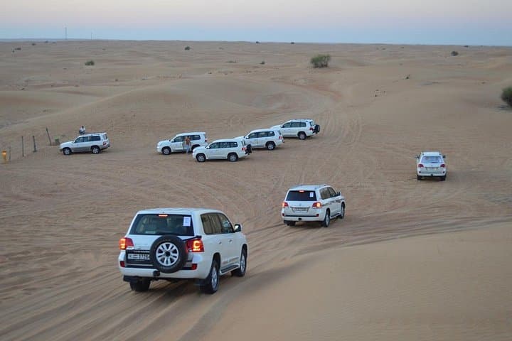 Dubai Private Desert Safari — 4WD Dune Bashing, Camel Ride & BBQ Under the Stars photo 1
