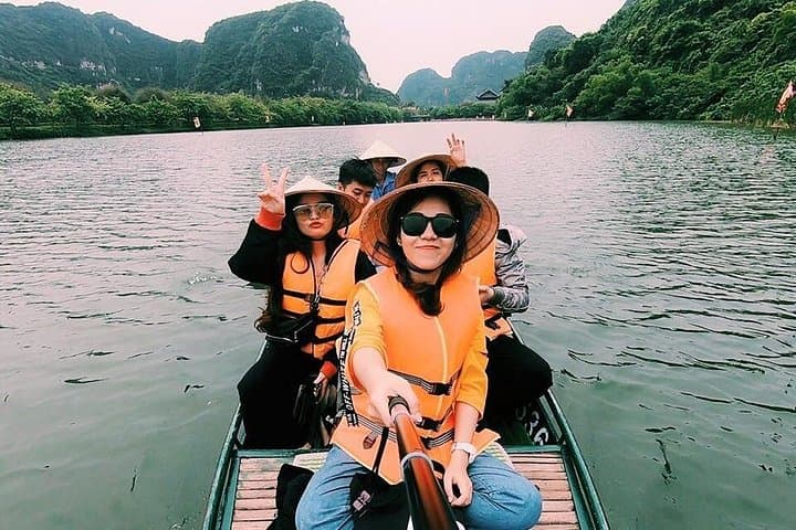 Tam Coc and Mua Cave Day Tour: Row, Ride and Climb through Ninh Binh's Limestone Valleys photo 1