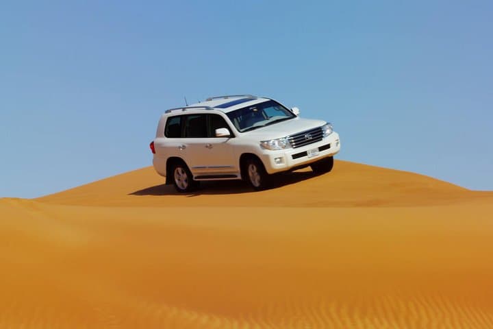 Sunset Dune Safari in RAK — Private Dune Bashing, Camel Ride & Bedouin Camp