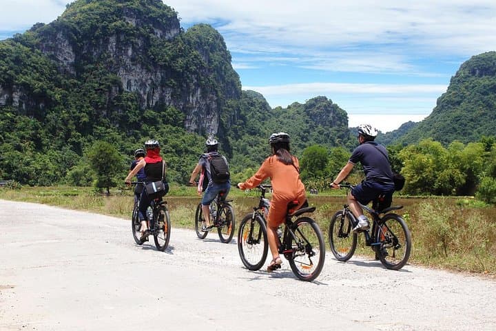 Ninh Binh Day Tour: Tam Coc Sampan, Mua Cave Climb & Countryside Biking photo 2