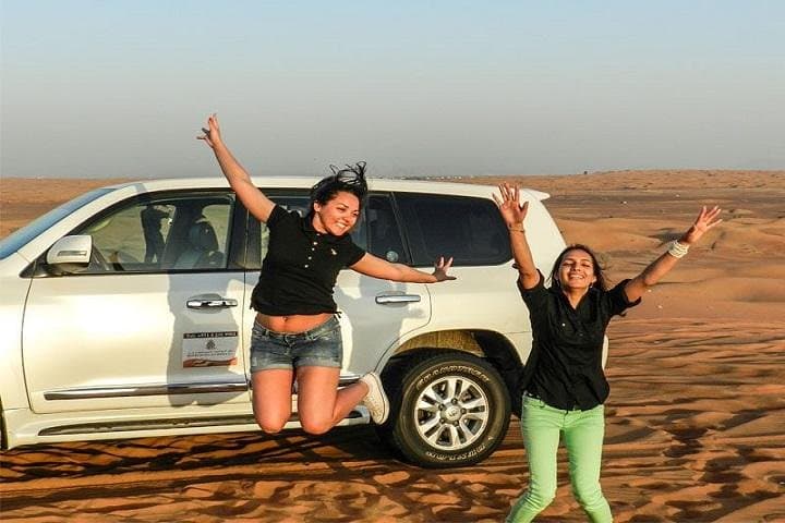 Dubai Afternoon Desert Safari: Dune Bashing, Camel Ride & BBQ Experience photo 4