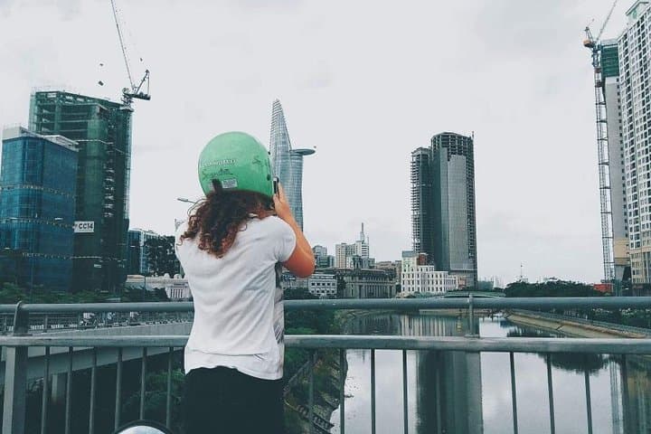 Saigon Morning Scooter Tour: Markets, Temples & Riverside Life photo 2