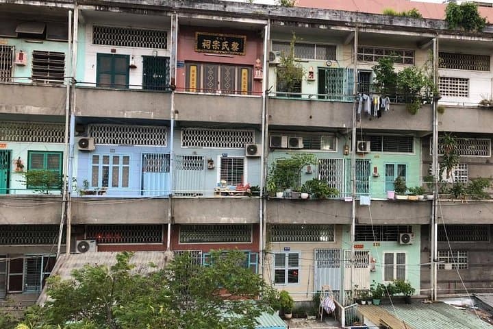 Scooter Through Saigon: Afternoon Food, Temples & Floating Market Tour