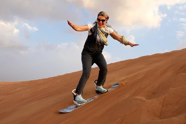 Dubai Red Dune Desert Safari: Dune Bashing, Camel Ride & BBQ Experience photo 2