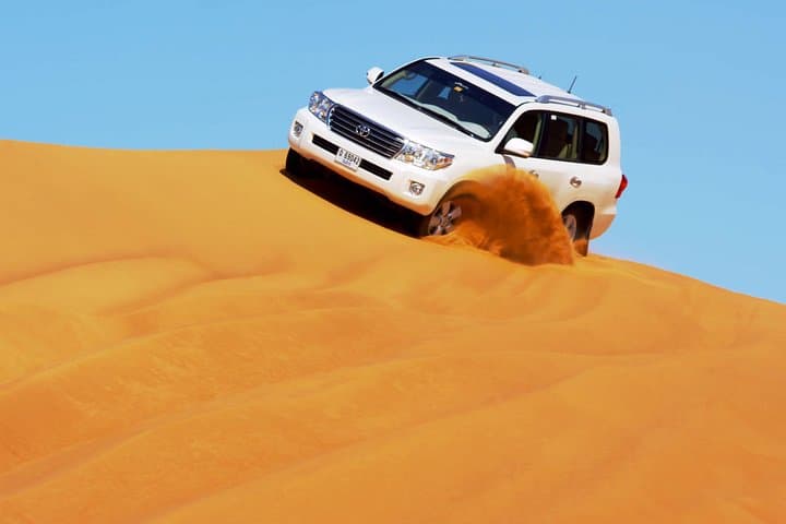 Dubai Evening Desert Safari: Dune Bashing, BBQ & Camel Ride