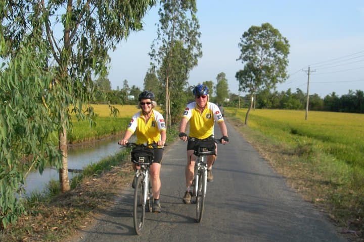 Mekong Delta Cycling to Cai Be: Full-Day Floating Market, Orchards & Local Lunch photo 2