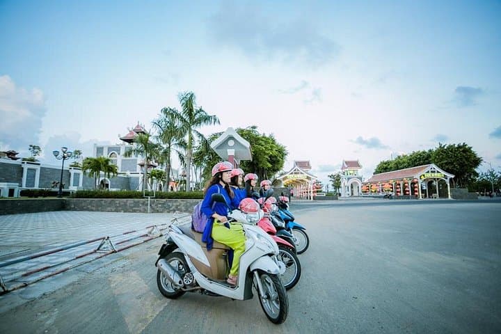 Da Nang Night Motorbike and Han River Cruise with Lady Riders photo 1