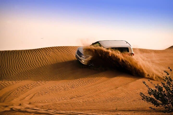 Dubai Evening Desert Safari: Dune Bashing, BBQ & Camel Ride photo 4