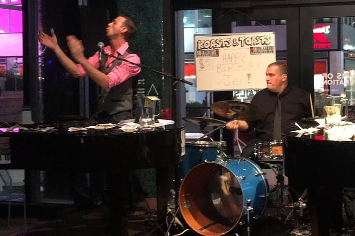 New Year's Eve Dueling Pianos in NYC — Open Bar & Midnight Toast at Chelsea Table & Stage photo 3