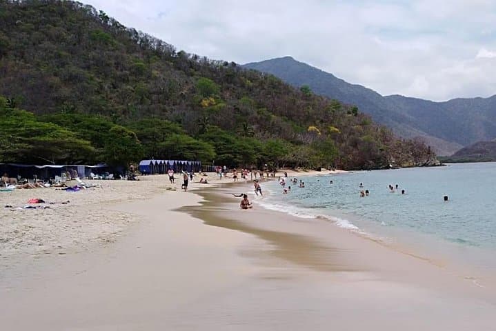 Full-Day Tayrona Park Tour to Playa Cristal from Cartagena — Guide to Beaches, Snorkeling & Seven Waves