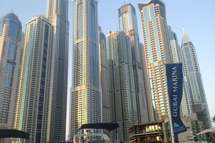 Dubai Full-Day: Burj Khalifa Entry, Marina Boat Ride & Fountain-Front Dinner photo 2