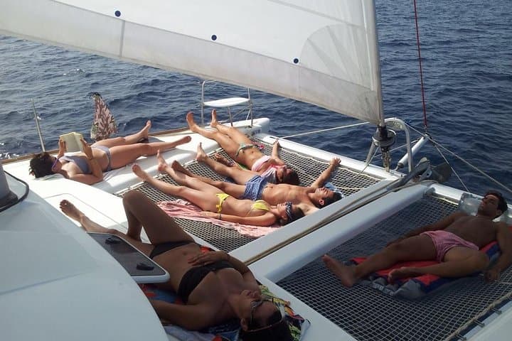 Ibiza Catamaran Beach Hopping: Swim, Snorkel & Sunset by Es Vedrà photo 4