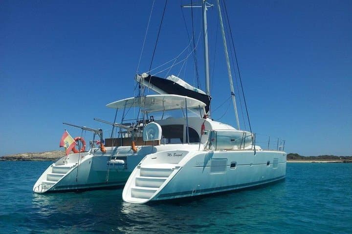 Ibiza Catamaran Beach Hopping: Swim, Snorkel & Sunset by Es Vedrà