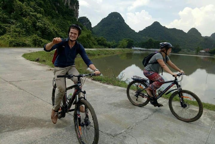 Tam Coc & Hoa Lu Day Tour: Cycling Rice Fields, Boat Caves and Ancient Capital photo 2