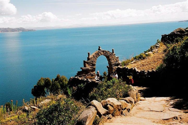 Explore Lake Titicaca: Uros Floating Islands & Taquile Full-Day from Puno