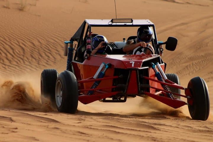 Drive Dubai's Red Dunes: 1000cc Buggy Ride with Camel & Falcon Photo photo 2