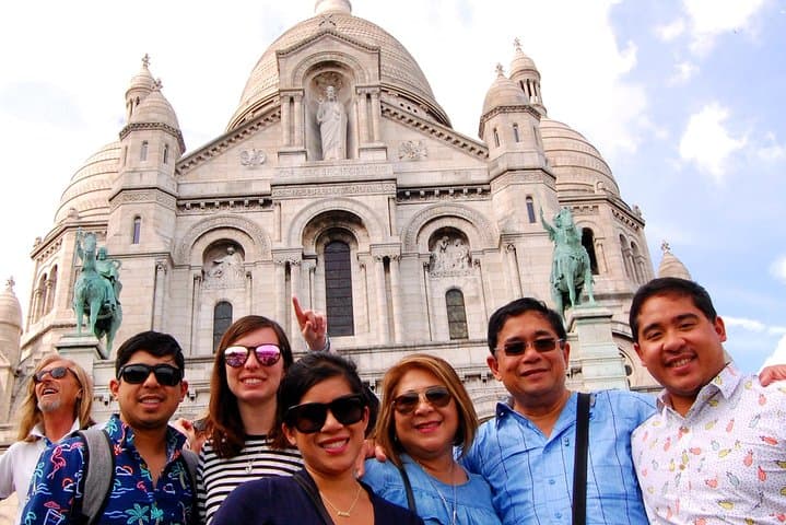 Paris Private Day Tour: Montmartre, Louvre, Notre-Dame, Sainte-Chapelle & Eiffel Tower photo 1