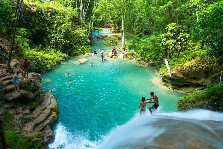Negril to Ocho Rios: Blue Hole & Dunn's River Waterfall Adventure with Lunch and Local Markets photo 3