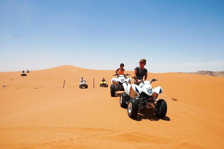 Red Dune Desert Safari with Quad Bike, Camel Ride & BBQ Dinner — Dubai Evening Adventure photo 1