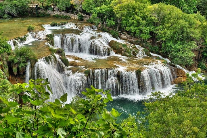 Exploring Krka Waterfalls: Scenic Boat Ride and Swimming Adventure from Split photo 4