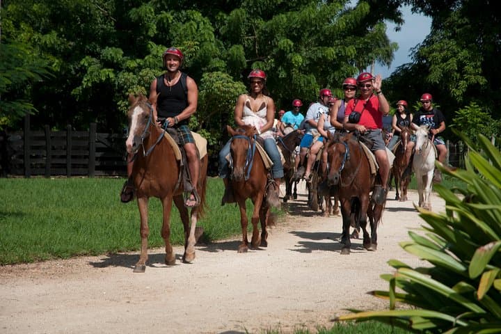 Puerto Plata Triple Adventure: Damajagua Waterfalls, Horseback Ride & 8‑Line Zipline photo 2