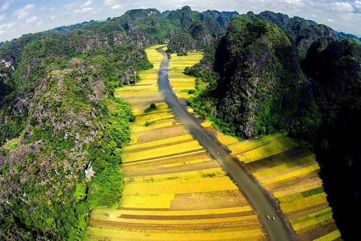 Hoa Lu & Tam Coc Small-Group Tour — Row Tam Coc, Cycle Rice Fields, Explore Ancient Capital photo 3