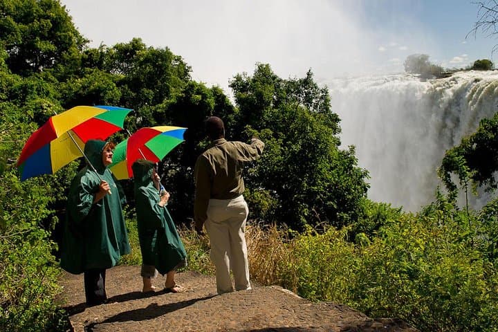 Victoria Falls to Nakavango: Guided Falls, Village Visit & Night Game Drive with Bush Dinner photo 2