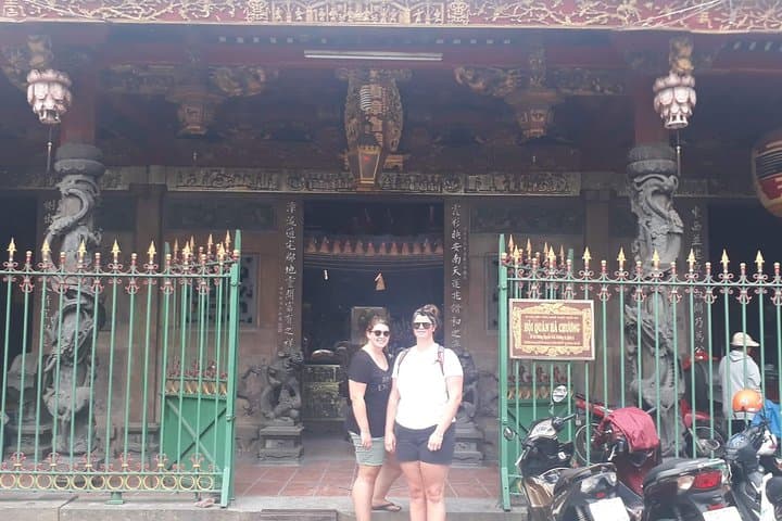 Scooter Through Saigon: Afternoon Food, Temples & Floating Market Tour photo 5