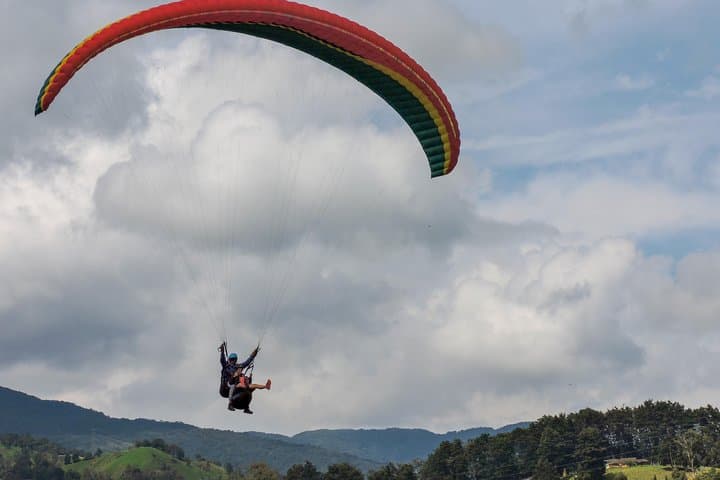 Tandem Paragliding Over Medellín: 15-Minute Flight from San Félix photo 2