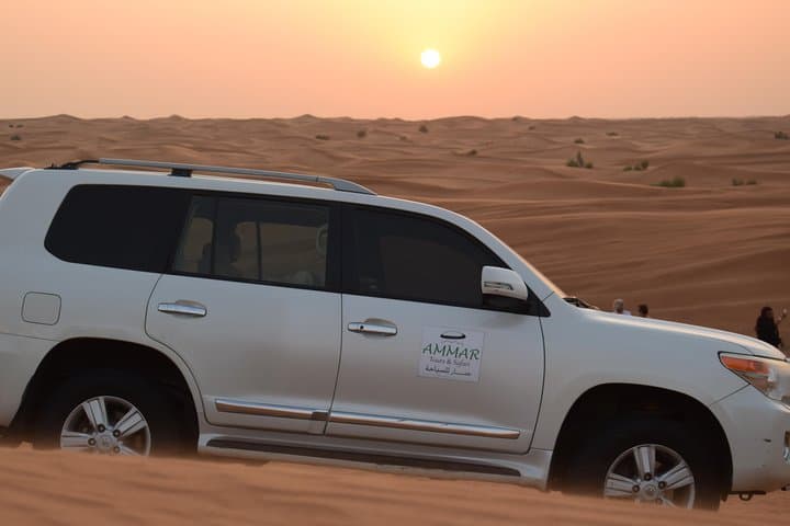 Dubai Red Dune Desert Safari: Private 4x4 Dune Bashing, Sandboarding & BBQ Experience photo 2