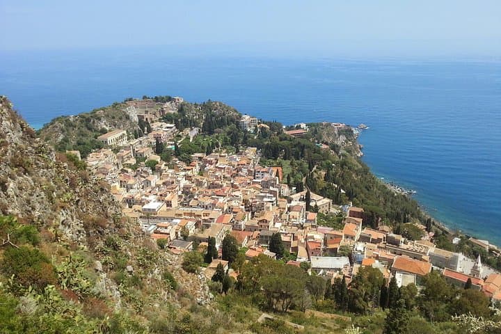 Etna and Taormina Day Tour: Hike Lava Flows, Explore Caves & Taste Sicilian Flavors photo 1