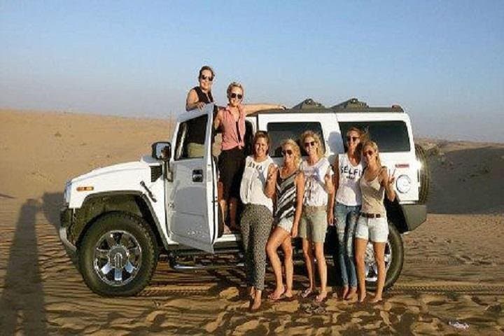 Dubai Afternoon Desert Safari: Dune Bashing, Camel Ride & BBQ Experience
