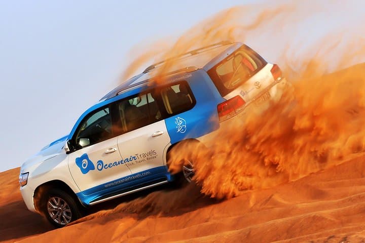 Abu Dhabi Desert Safari: Evening Dune Bashing, Camel Ride & BBQ Experience