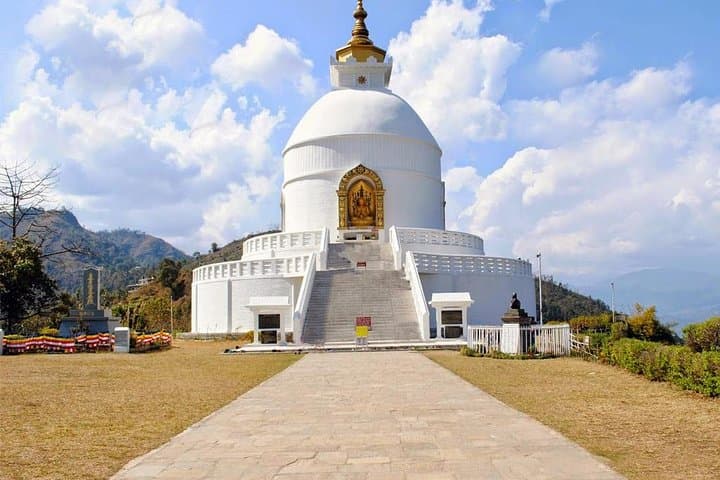 Pokhara Falls, Cave & World Peace Stupa: Essential Half-Day Tour from Lakeside