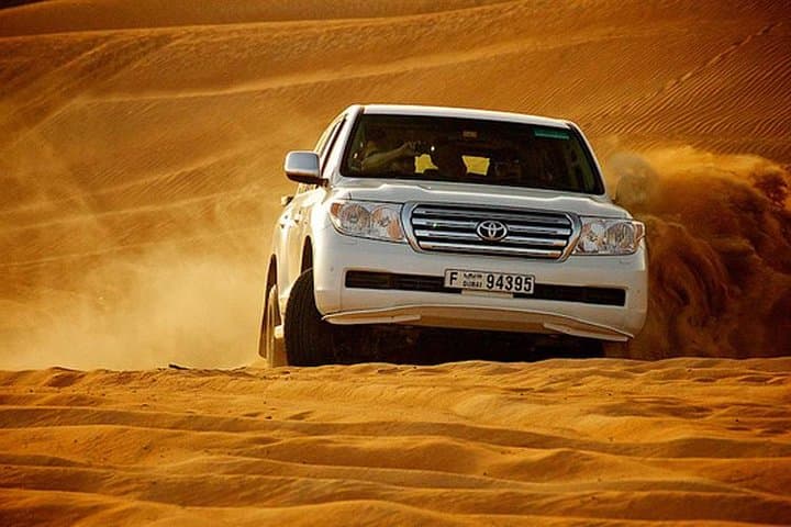 Morning Desert Safari Dubai: Sunrise Dune Bashing & Sandboarding photo 3