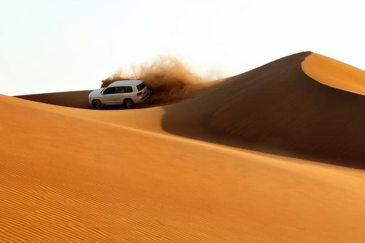 Dubai Red Dunes Evening Safari: Dune Bashing, Camel Ride & BBQ at Al Khayma Camp photo 1