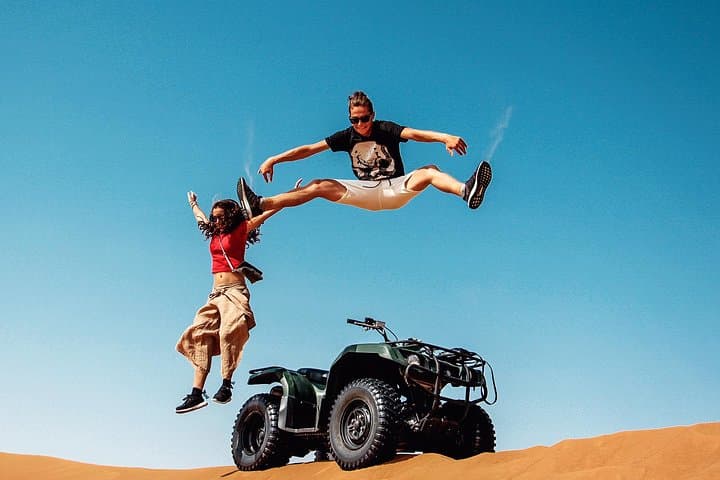 Dubai Desert Quad Biking: Red Dunes, Camel Rides & Sandboarding photo 4