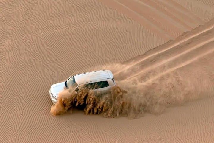 Sunrise Desert Safari Dubai: Morning Dune Drive, Camel Ride & Sandboarding photo 3