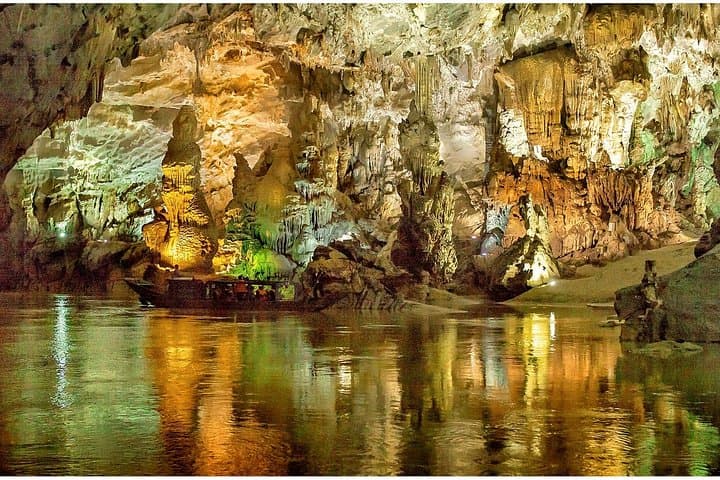 Phong Nha & Paradise Caves Full-Day Tour from Dong Hoi — Boat, Stairs & Stalagmites photo 4
