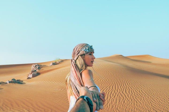 Morning Red Dunes Safari: Camel Ride, Dune Bashing & Sandboarding in Lahbab photo 4