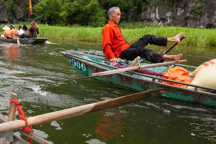 Tam Coc & Hoa Lu Day Trip: Cycling the Rice Fields, Boat Caves & Local Buffet from Hanoi photo 4