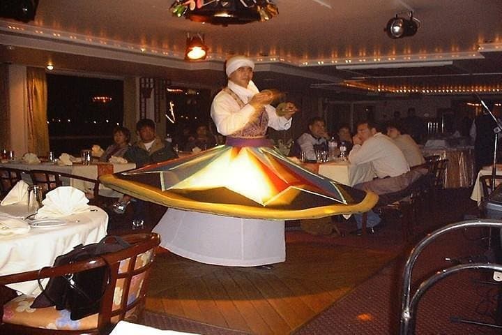 Evening Nile Dinner Cruise in Cairo: Live Music, Belly Dance & Tanura Show photo 2