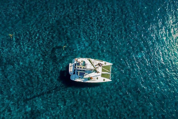Santorini Half‑Day Catamaran Cruise — Volcano Swim, Hot Springs & Akrotiri Views photo 1