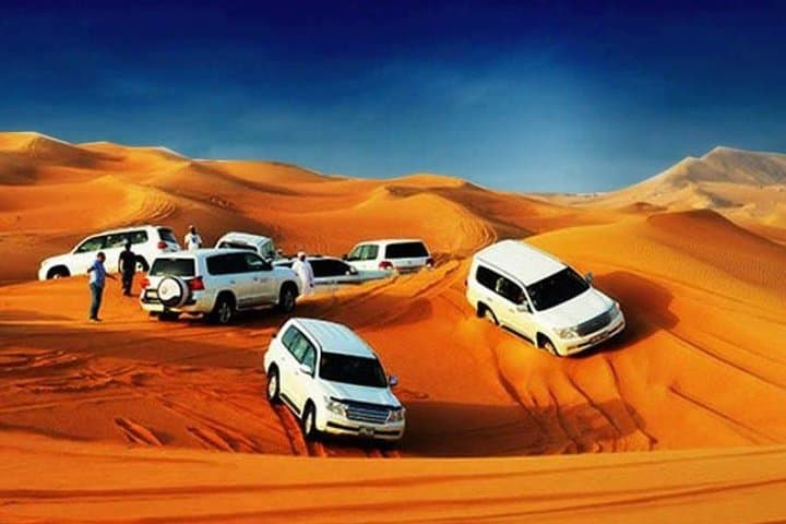 Dubai VIP Evening Desert Safari by Land Cruiser — Dune Bashing, Dinner & Live Shows