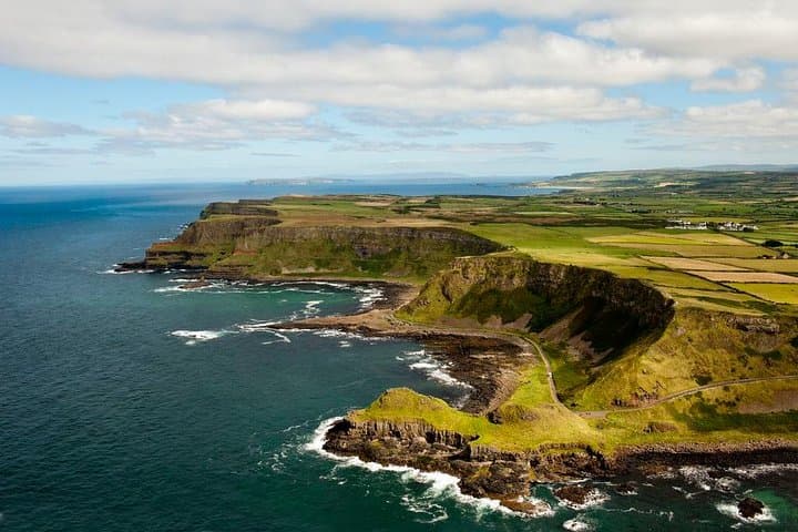 Dublin to Giant's Causeway: Dunluce Castle, Dark Hedges & Belfast Day Tour photo 5