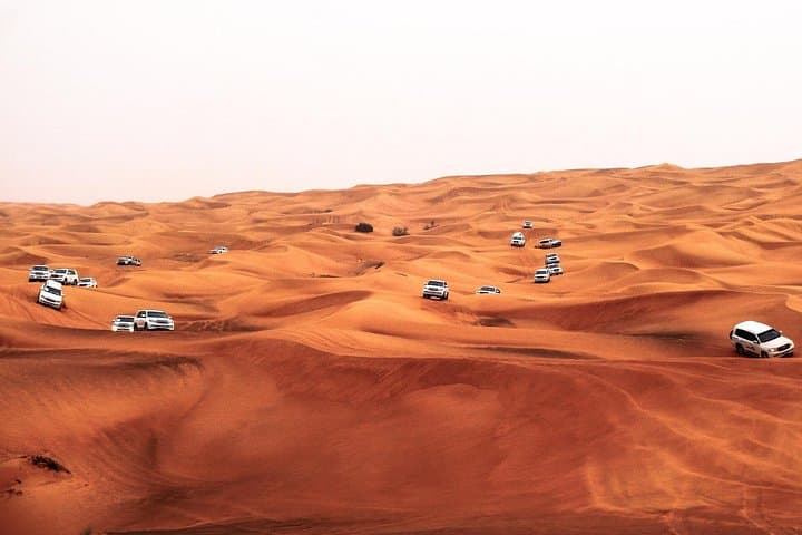 Morning Desert Dune Bashing Safari in Dubai — Red Dunes, Sandboarding & Camel Ride photo 1