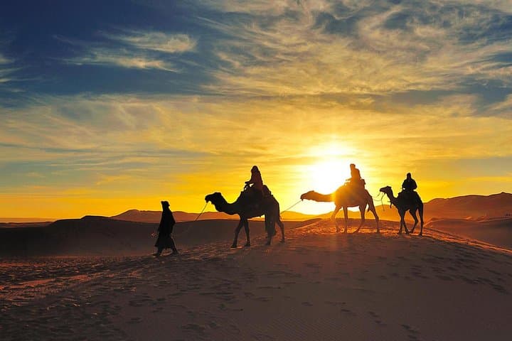 Merzouga Sunset Adventure — Camel Trek, Dune Hike & Sandboarding at Erg Chebbi