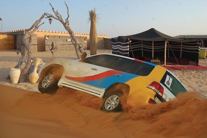 Dubai Desert Dune Bashing, Sandboarding & BBQ Camp Experience