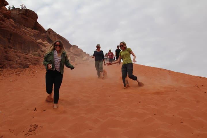 Wadi Rum Full-Day Jeep Tour with Bedouin Guide — Nabatean Inscriptions, Sand Dunes & Sunset